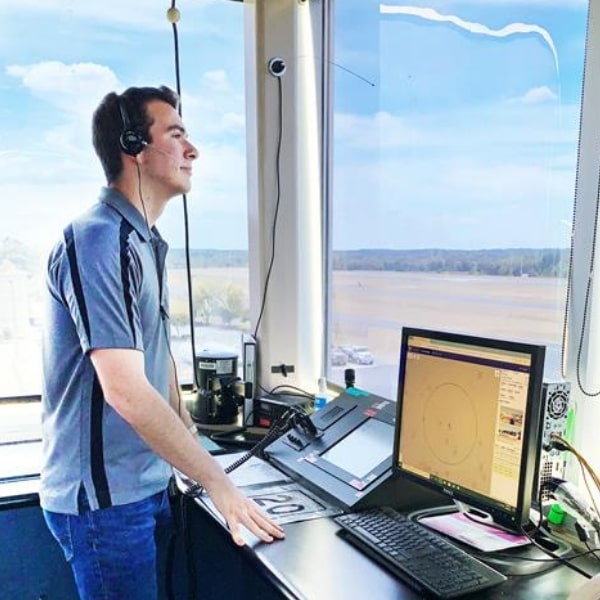Student looking out of the air traffic control tower