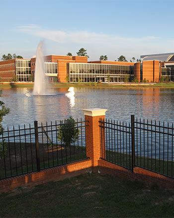 Macon campus lake with fountain.